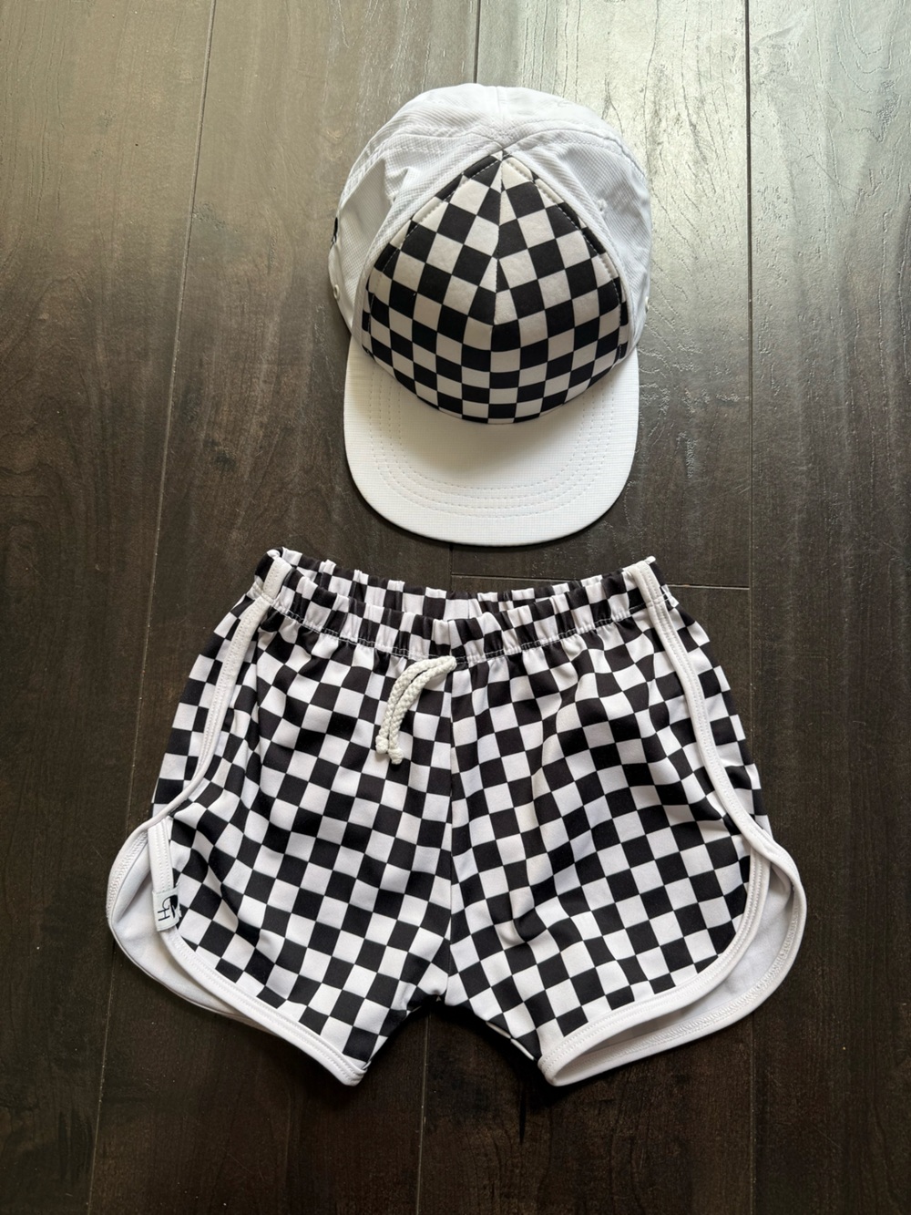 George Hats Kids black and white checkered Swim Shorts and trucker hat